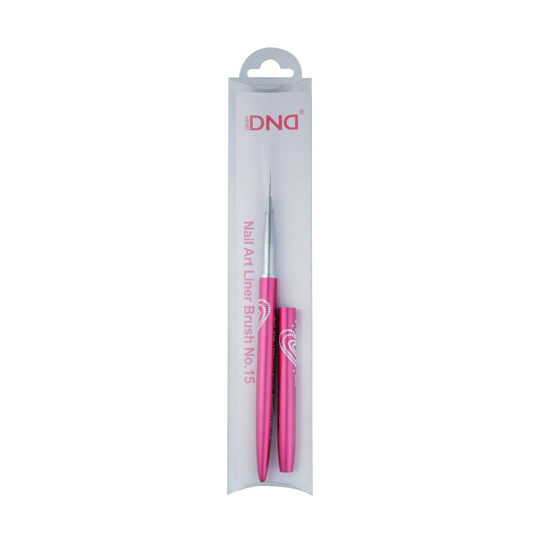 DND nail art liner brush (size 15) in its blister-pack packaging, magenta/pink metallic handle with a silver rhinestone heart design