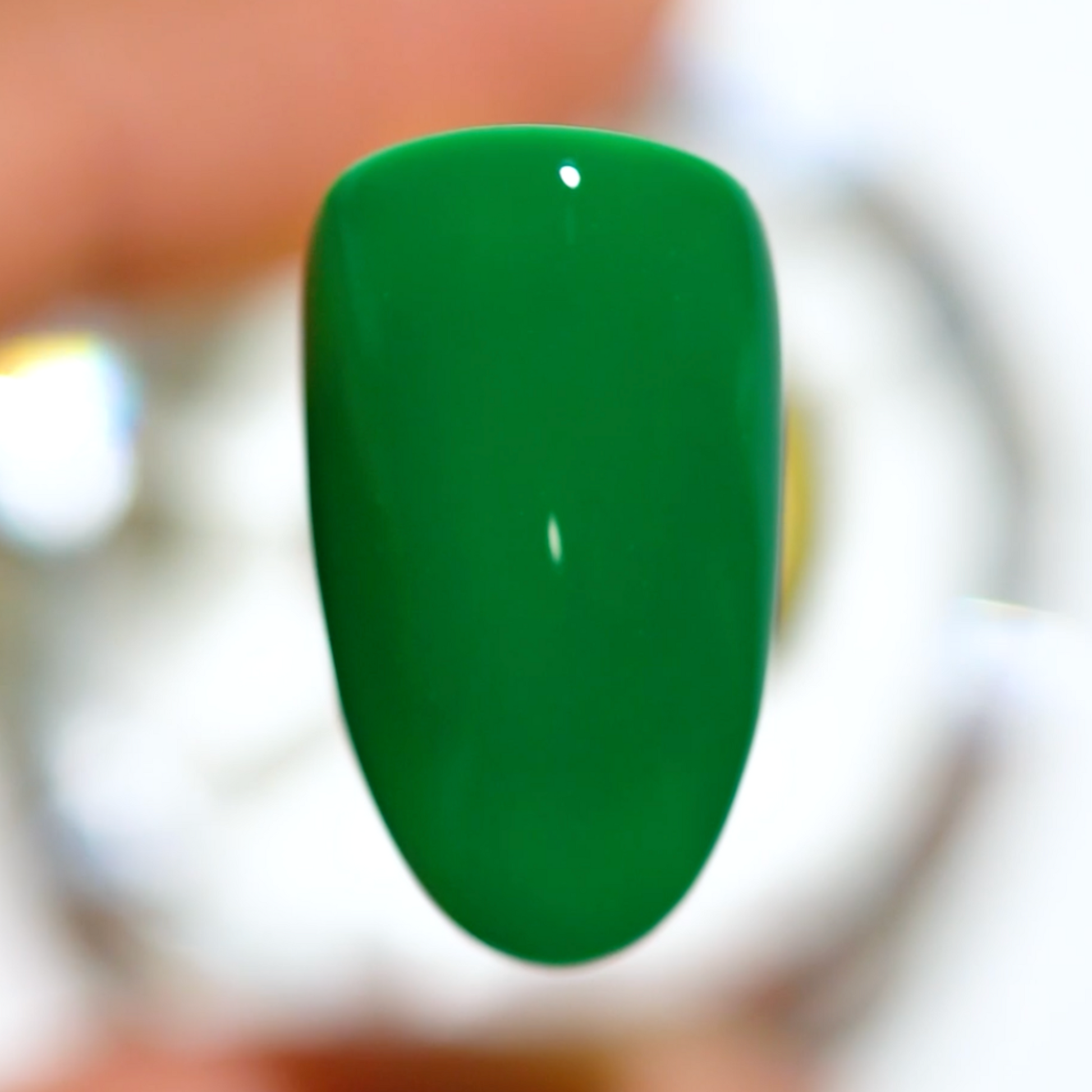 color swatch of glossy jade green polish perfect for long-lasting manicure