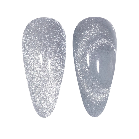 Two nail tip swatches of DND 9D Cat Eye Velvet Jungle #05 Smoke & Whiskers in cool silver iridescent with a magnetic cat-eye stripe
