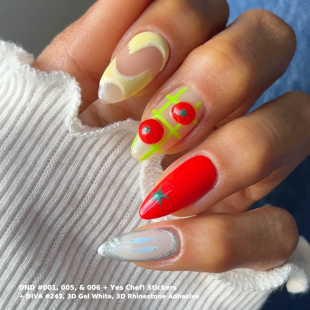 Hand with white nails featuring red dot nail art