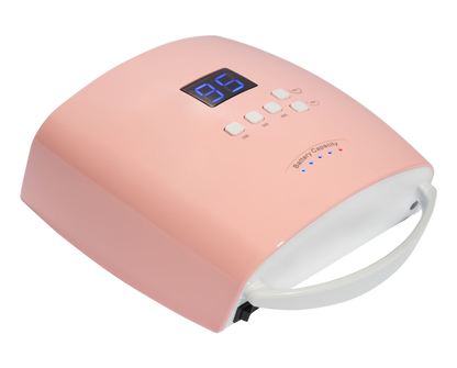 Pink gel nail lamp with digital display on a white background