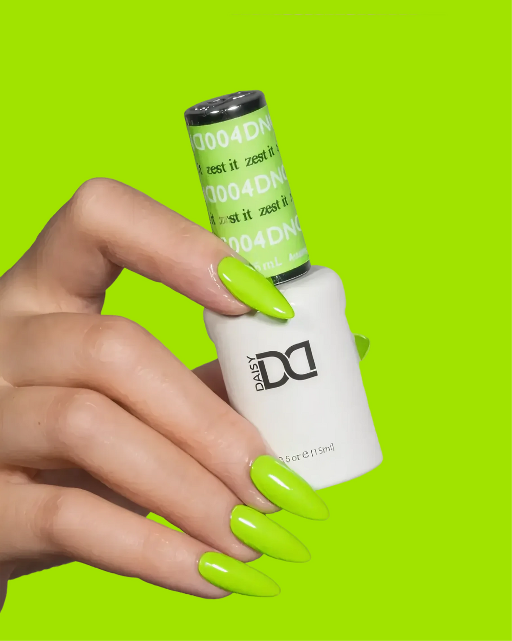 Hand with lime green nails holding a DND gel polish bottle labeled "Zest It"