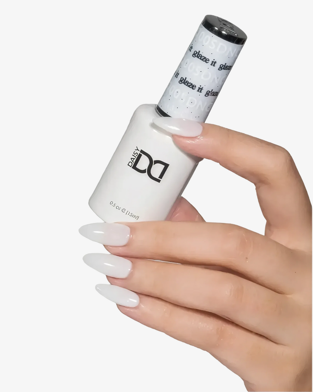 Hand with sheer white nails holding a DND gel polish bottle labeled "Glaze It"
