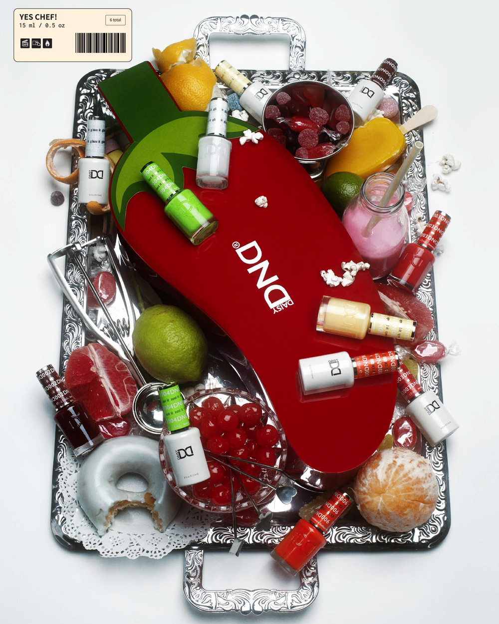 Red tray with assorted Yes Chef themed nail products