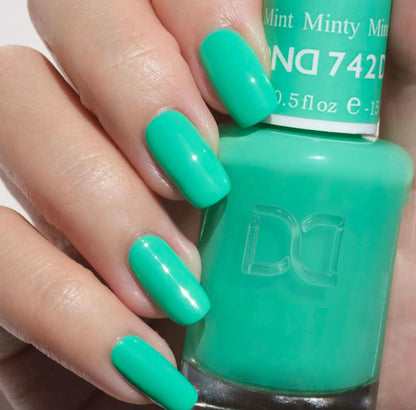 minty mint green gel polish with glossy finish on almond square nails
